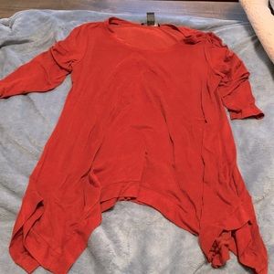 Size medium. More of burnt orange color in person